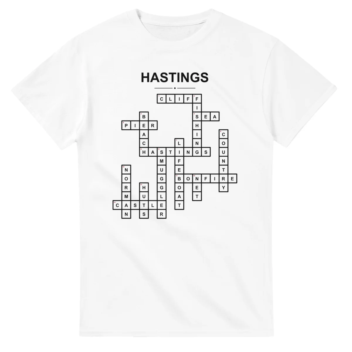Monochrome crossword sheet for Hastings, with a large place-name heading, a letter grid, and numbered across and down clues.