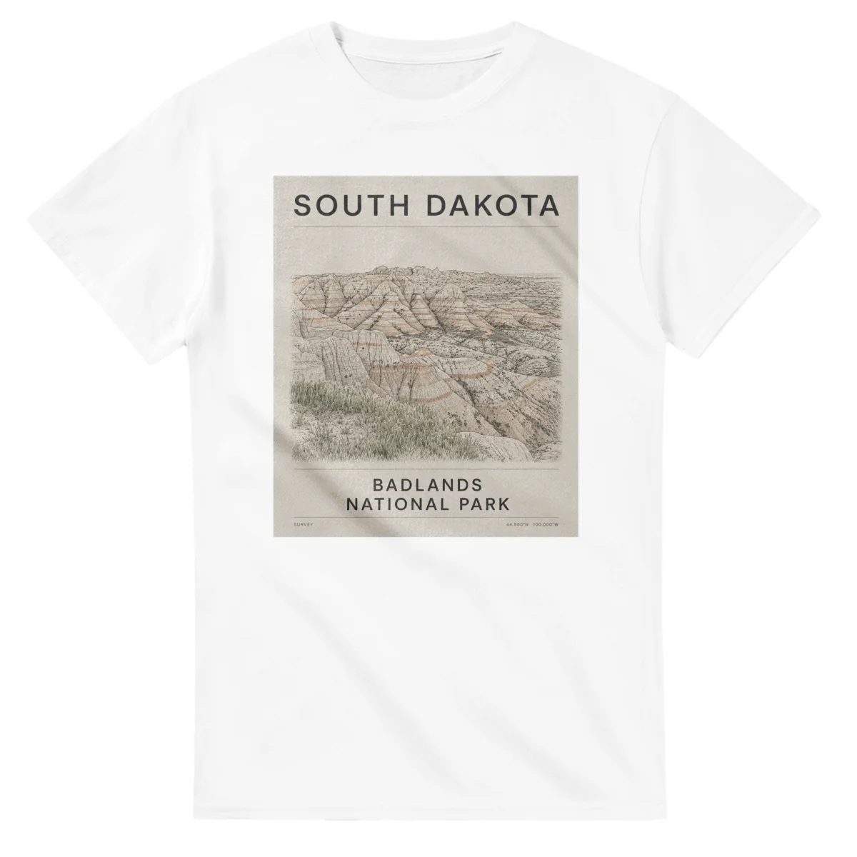 Fine-line engraving-style drawing for South Dakota, with a landmark caption and small coordinate text.