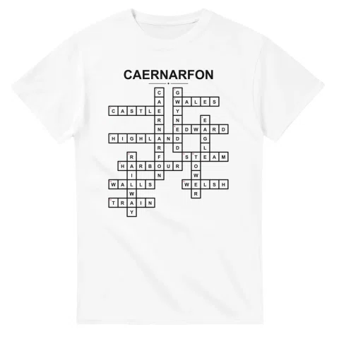 Monochrome crossword sheet for Caernarfon, with a large place-name heading, a letter grid, and numbered across and down clues.