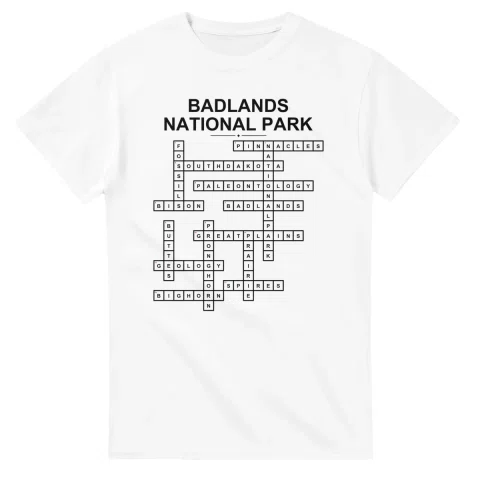 Monochrome crossword sheet for Badlands National Park, with a large place-name heading, a letter grid, and numbered across and down clues.