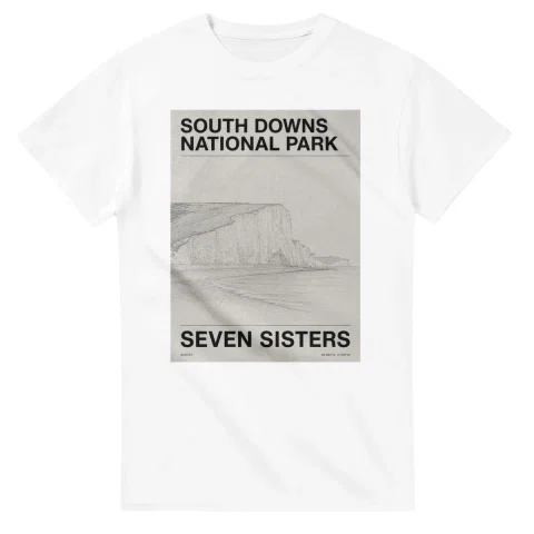 Fine-line engraving-style drawing for South Downs National Park, with a landmark caption and small coordinate text.